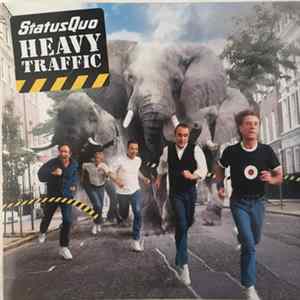 Status Quo - Heavy Traffic FLAC